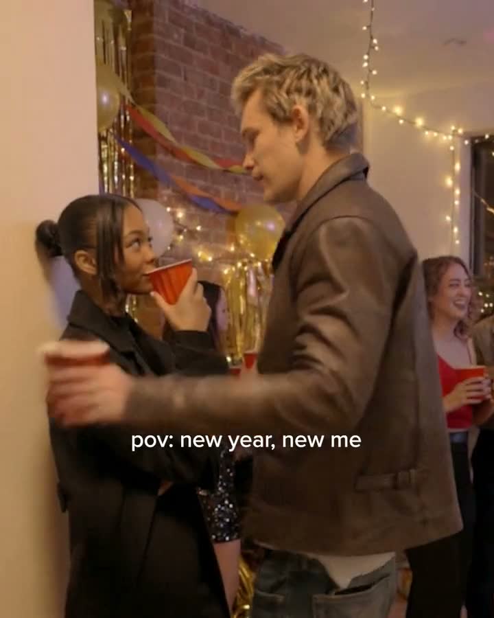 New Year, New Me: the film opens at a New Year's party; a close-up of her, then she falls through a black void